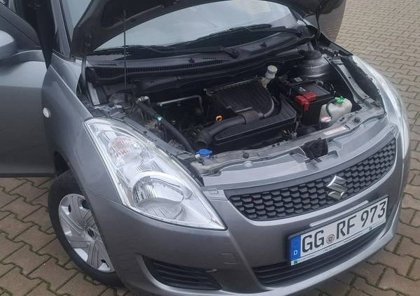 Suzuki Swift cena 27900 przebieg: 164114, rok produkcji 2010 z Olsztyn małe 191